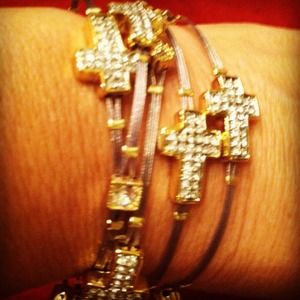 Multi cubic zirconia cross bracelet.