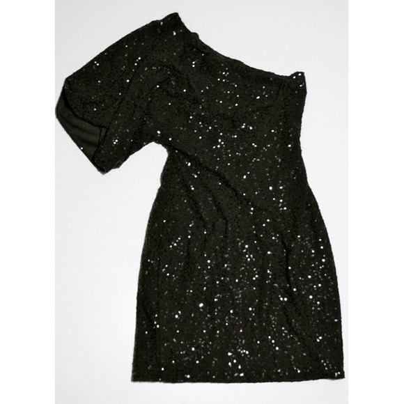 Black sequin tight dress with one sleeve.