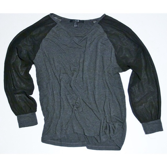 Grey loosely fitted top. Black mesh sleeves.