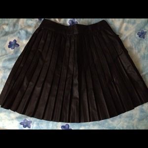 Faux leather pleated skirt.