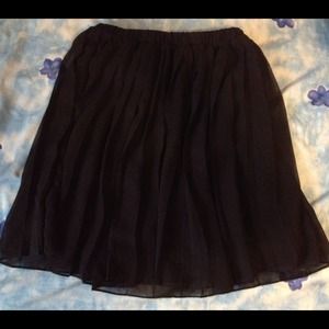 Pleated black chiffon sparkle and fade skirt.