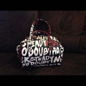 L.A.M.B/ no doubt purse in good condition