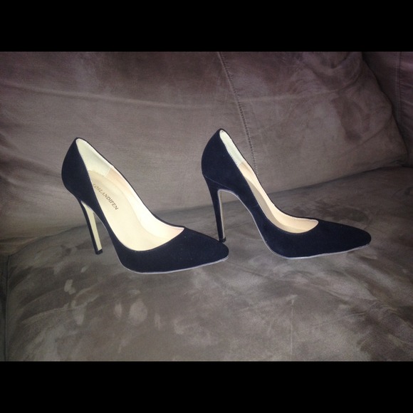 Black suade pointed heels.