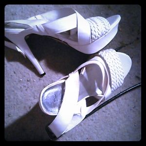 White held with a buckle backing.