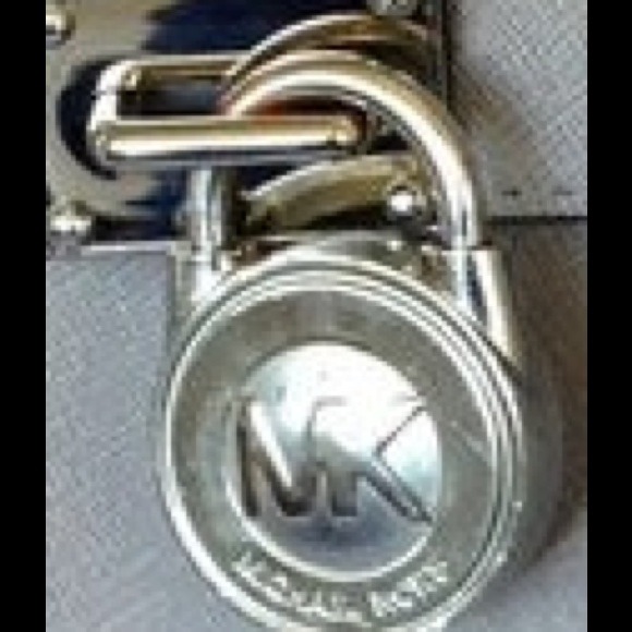 Looking for this lock , in silver