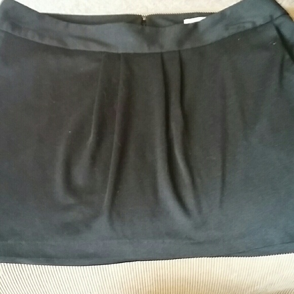 Large black mini skirt