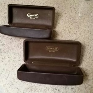 2 brown leather Coach brand sunglasses cases