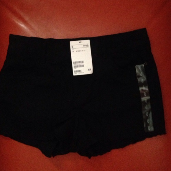 Black cut off H & M shorts