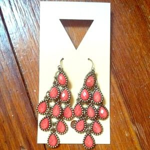 Shiny coral-colored stone earrings