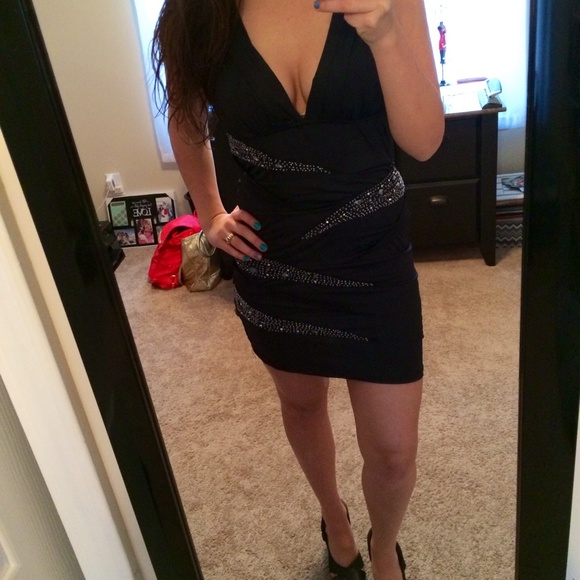 Slimming black ruffle dress