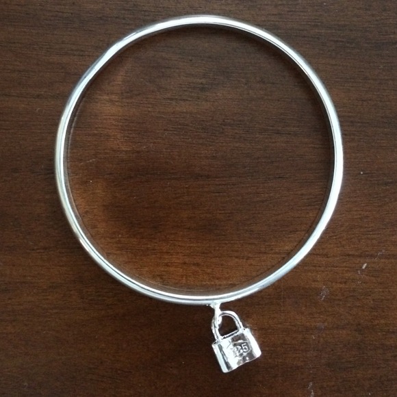 Silver lock bangle bracelet. Brand new w/o tags.