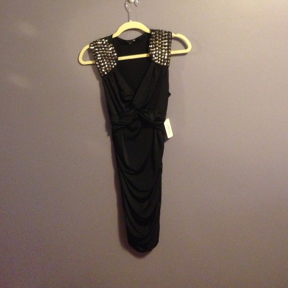 Black stretch dress with shoulder detail