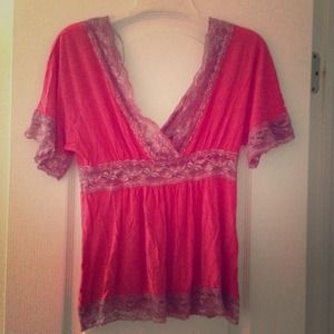 Super cute coral top with lace trim!