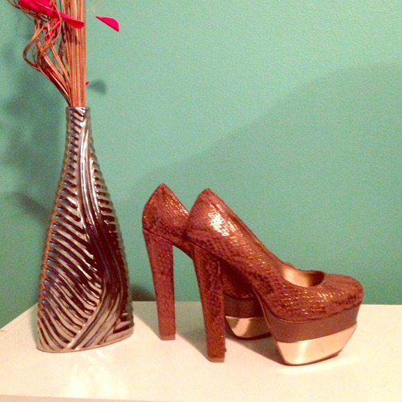 Snakeskin Pumps