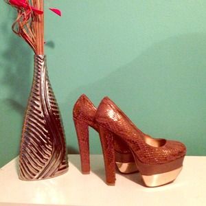 Snakeskin Pumps