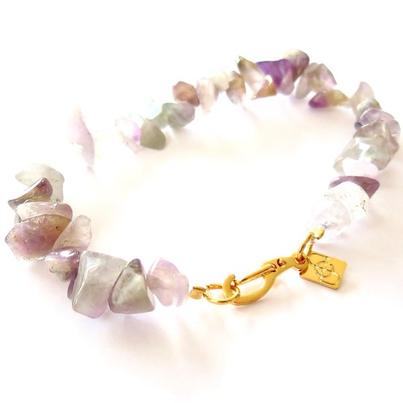 Genuine amethyst rock bracelet comes with pouch.