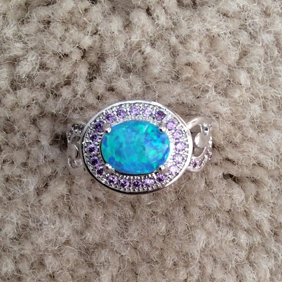 Blue fire opal with amethyst ring