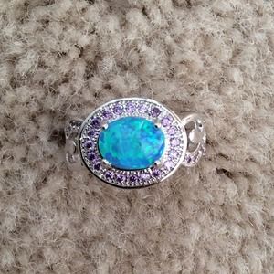 Blue fire opal with amethyst ring