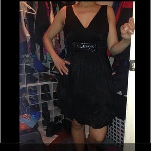 Little black dress with silver detail in middle