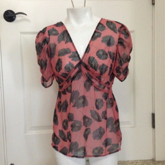Sheer blouse.