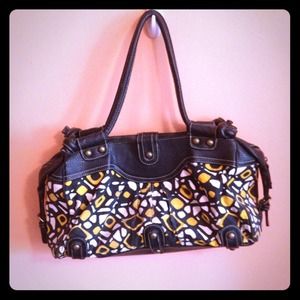 Black, white, and yellow patterned handbag