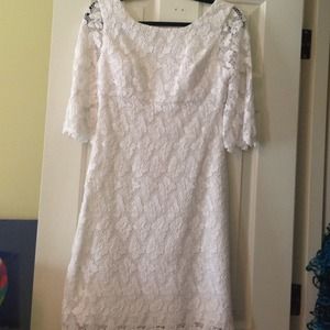White lace dress. Quarter sleeves, V back
