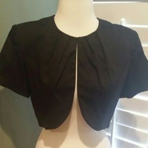 Very pretty cover up. 97% cotton 3% spandex.