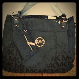Mk black and gold purse