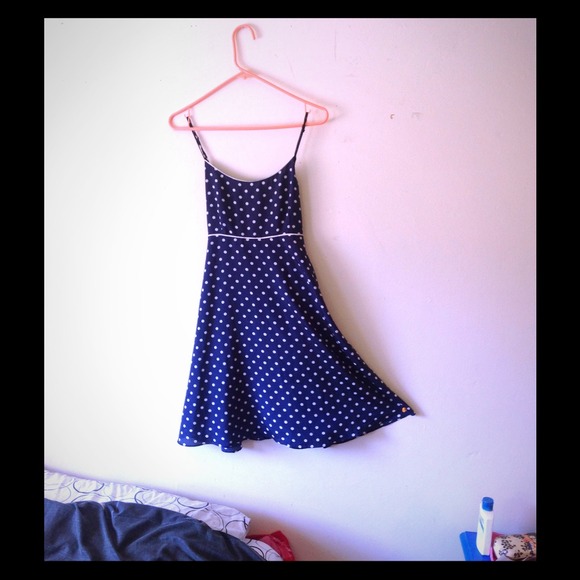Navy blue polka dotted dress.
