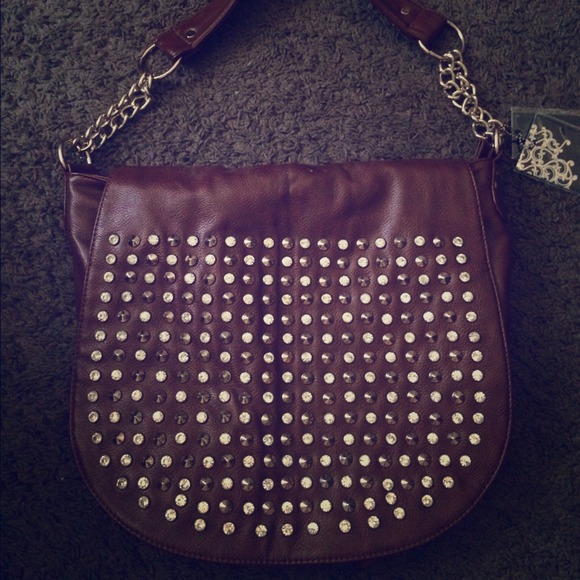 Brown studded handbag