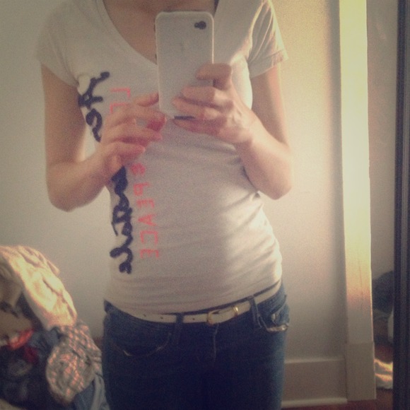 White t-shirt with pink and white lettering