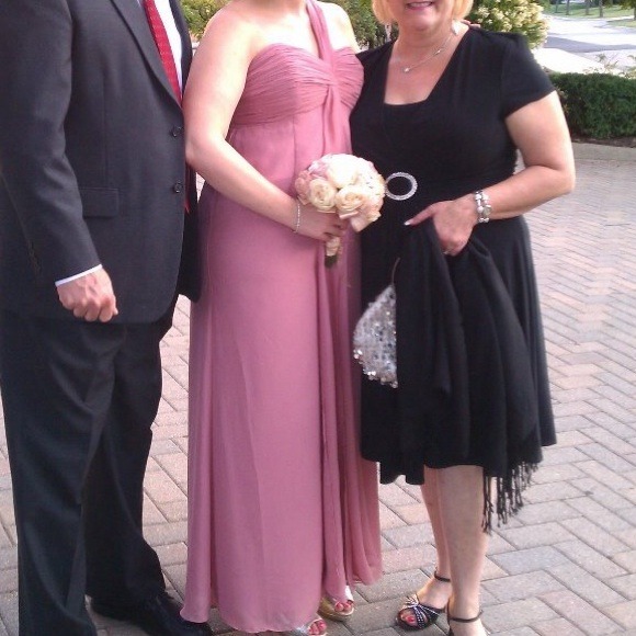 Pink floor length formal gown.