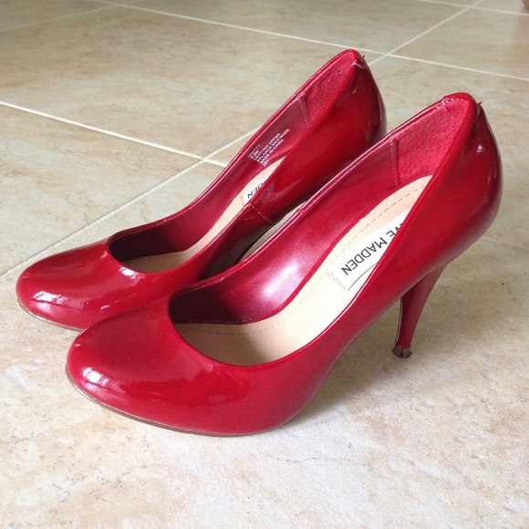 Red patent leather pumps