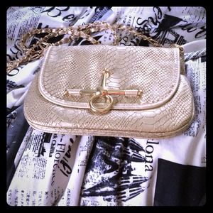 Gold purse from boutique in Florida