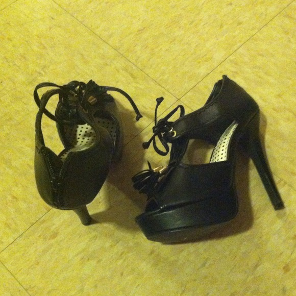 Black platforms on an ankle bootie. - Picture 1 of 1