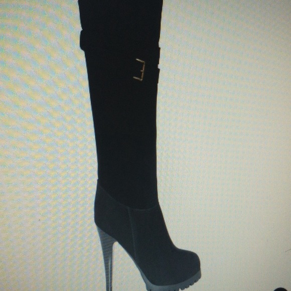 Faux suede shoe boot with wrap around belt.