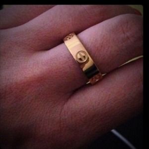 Bundle of 2 gold tone screw rings size 7