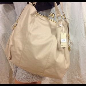 Huge cream leather handbag