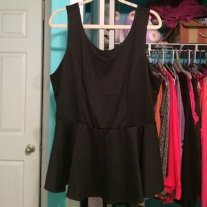 Black peplum blouse with bow on the back