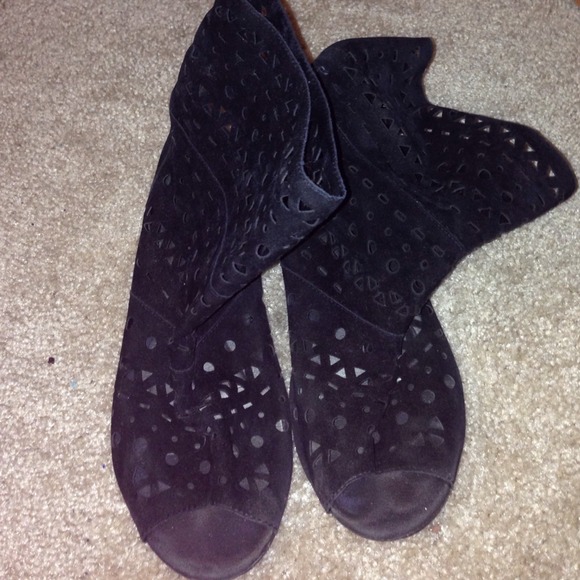 black sandal boots .