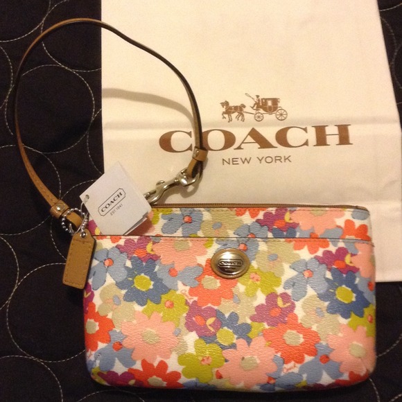 Coach Clutches & Wallets - (REDUCED AGAIN TODAY)  coach floral wristlet,