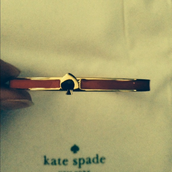 Kate Spade Bracelet, Red/Orange Color. Worn once.