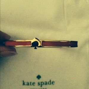 Kate Spade Bracelet, Red/Orange Color. Worn once.