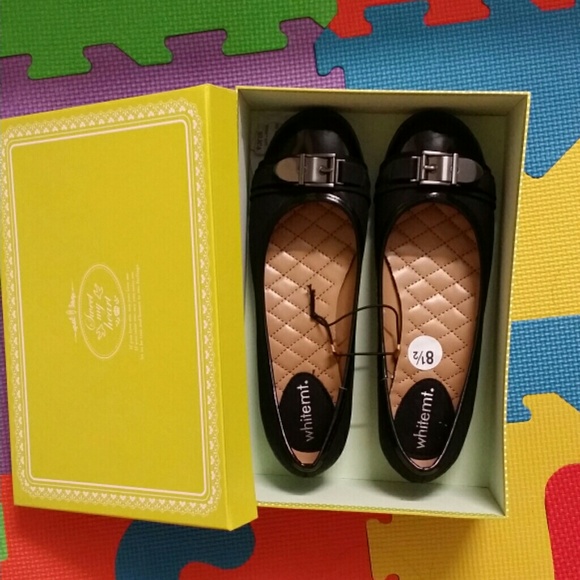 Black flat shoes.