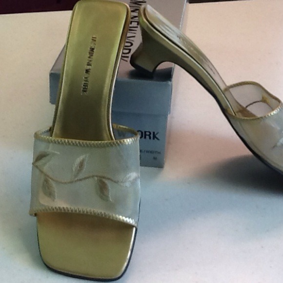 SOLD. TO KATHIE. Gold, size  8.5 slide sandles.