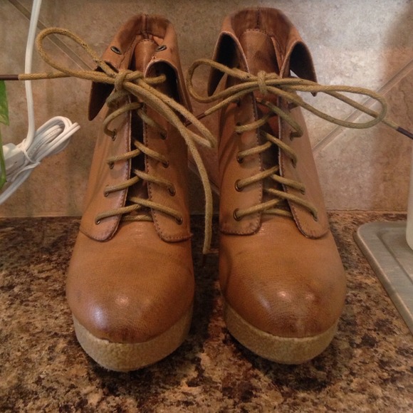 Closed in fold over boot heels