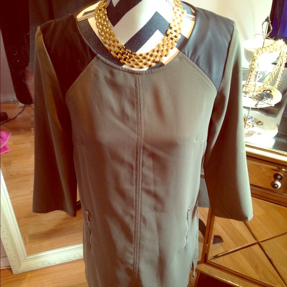 Army green dress. With faux leather trim