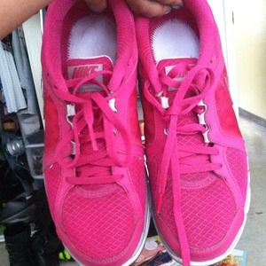 Pink Nike running shoes