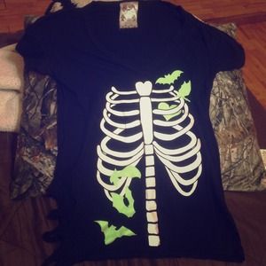 Black rib cage shirt with glow in the dark bats