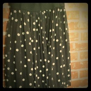 A little above the knee black and white skirt